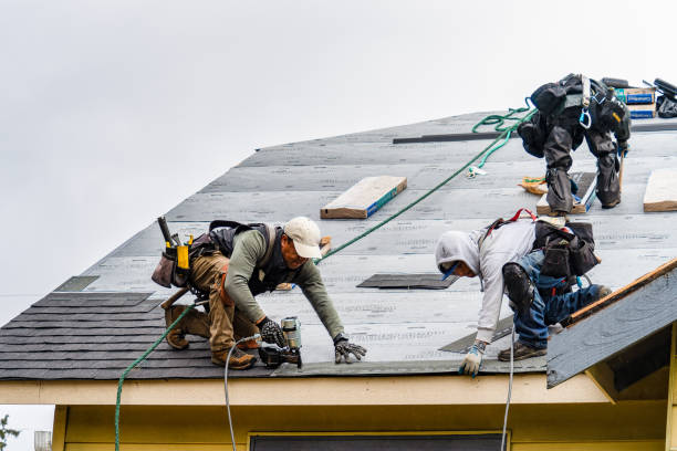 Professional Gutter Installation technician working in Ash, NC